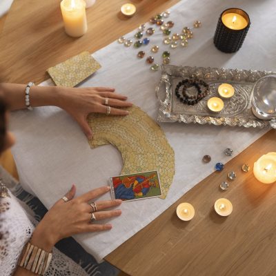high-angle-woman-reading-tarot